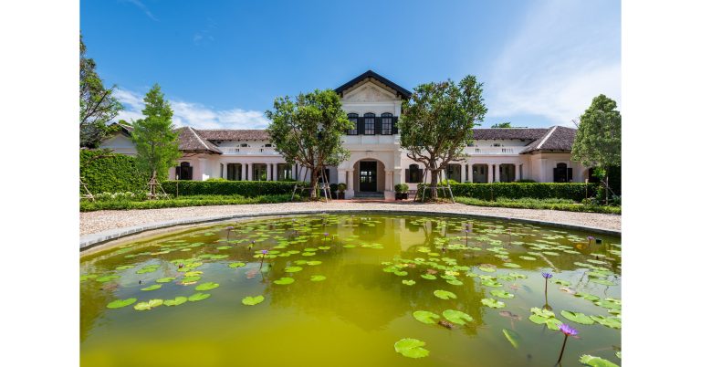 House Of Tin Baron Reflective Pond At The Main Entrance Daytime 1.jpg