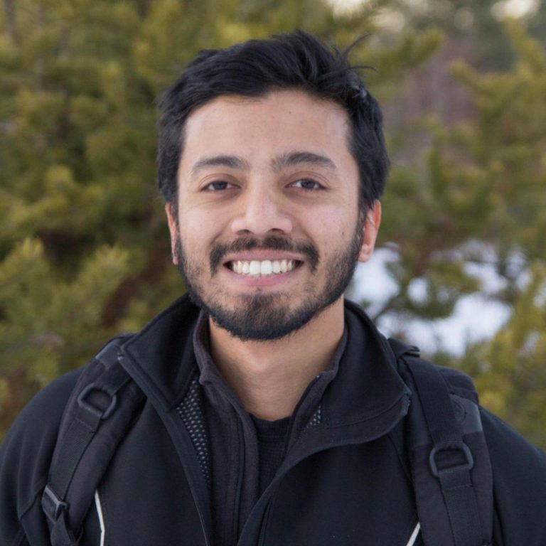 Raj Saha Headshot.jpg