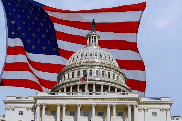 Washington Dc Capitol Building On Capitol Hill Detail On American Flag Background Usa.jpg
