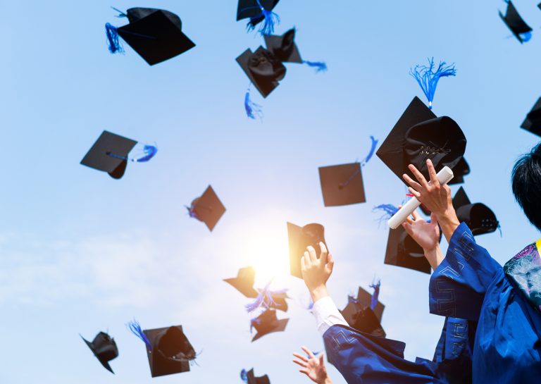 Graduation Caps Flying Into The Air After Being Tossed.jpg